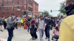 FILE - Minneapolis Mayor Jacob Frey walks away from protesters in the aftermath of the death in Minneapolis police custody of George Floyd, in Minneapolis, Minnesota, June 6, 2020, in this image obtained from video. (Courtesy - CTUL/Social Media)