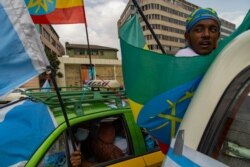 A supporter of one of the opposition parties takes part in a rally on the last day of the campaign for upcoming national elections in Addis Ababa, Ethiopia, June 16, 2021. (VOA/Yan Boechat)