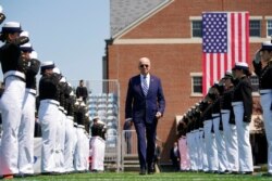 President Joe Biden arrives to speak at commencement at the U.S. Coast Guard Academy in New London, Conn., May 19, 2021.