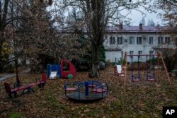 A view of the courtyard of Kherson regional children's home in Kherson, southern Ukraine on November 25, 2022. (AP Photo/Bernat Armangue)