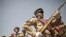 Military academy cadets march during a parade marking the 22nd anniversary of Yemen's reunification in Sanaa May 22, 2012. 