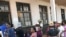 Madagascans line up to cast their votes in a referendum in Antananarivo, 17 Nov 2010