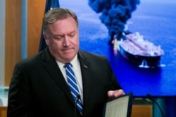 FILE - Secretary of State Mike Pompeo closes his remarks as he departs after a media availability, at the State Department, June 13, 2019.