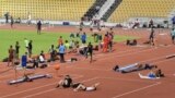 Athletes exercise during an evening training session prior the start of the World Athletics Championships in Doha, Qatar, Sept. 25, 2019.