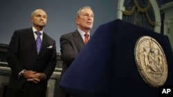 New York City Mayor Michael Bloomberg, right, speaks while Police Commissioner Ray Kelly looks on during a news conference in New York, Aug. 12, 2013. 