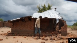 FILE - Angry villagers in Phalombe district destroyed this house in 2018 after accusing its owners of withholding rains through magic. The existence of vampires is another common superstition in Malawi. (Lameck Masina/VOA)