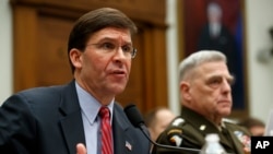 Defense Secretary Mark Esper, left, and Joint Chiefs Chairman Gen. Mark Milley testify before a House committee on U.S. policy in Syria, Dec. 11, 2019, on Capitol Hill in Washington. 