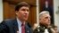 Defense Secretary Mark Esper, left, and Joint Chiefs Chairman Gen. Mark Milley testify before a House committee on U.S. policy in Syria, Dec. 11, 2019, on Capitol Hill in Washington. 
