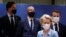 Dutch Prime Minister Mark Rutte, European Council President Charles Michel, French President Emmanuel Macron and European Commission President Ursula von der Leyen are seen wearing face masks during the last roundtable discussion, July 21.