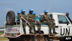 UN peacekeepers secure a section of the airport as members of the United Nations Security Council arrive in the South Sudanese capital, Juba, on August 12, 2014. (AFP)