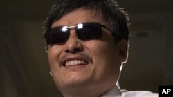 Blind Chinese activist Chen Guangcheng, who flew to the United States last week, said China's handling of the local officials who harassed and abused him and his family will determine whether the country can begin to achieve rule of law, May 24, 2012.