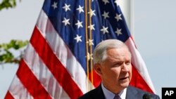 Attorney General Jeff Sessions speaks at a news conference after touring the U.S.-Mexico border with border officials, April 11, 2017, in Nogales, Ariz. Sessions announced making immigration enforcement a key Justice Department priority.