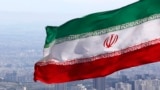 FILE - Iran's national flag waves in Tehran, Iran, March 31, 2020.