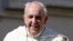 Pope Francis smiles as he arrives to lead his Wednesday general audience in Saint Peter's Square at the Vatican May 14, 2014. REUTERS/Max Rossi (VATICAN - Tags: RELIGION) - RTR3P1VJ