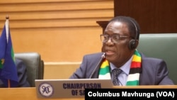 FILE - Zimbabwe’s President Emmerson Mnangagwa, current chairman of the 16-nation Southern African Development Community, SADC, is pictured at Mount Hampden in Zimbabwe, Nov. 2024, during a SADC meeting. Mnangagwa said the post-election violence in Mozambique must end.