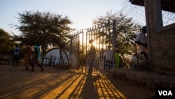 Many come and go freely outside Mother of Mercy hospital. Nuba Mountains. (Adam Bailes/VOA News)