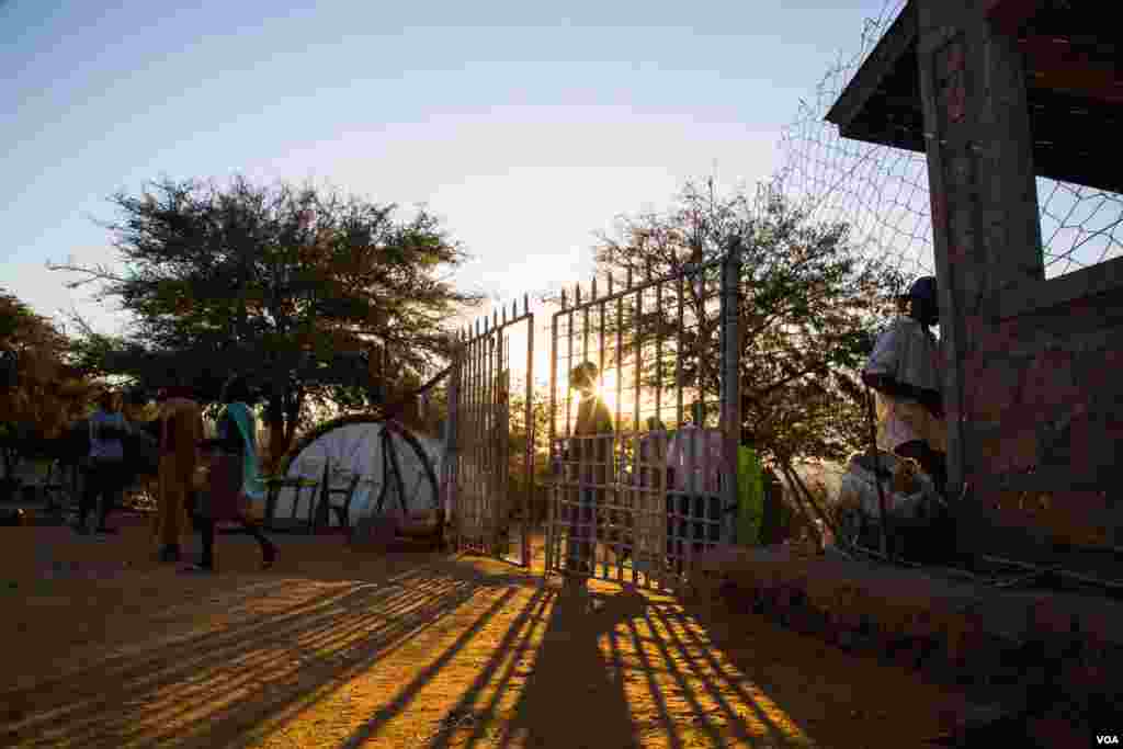 Many come and go freely outside Mother of mercy hospital. Nuba Mountains. (Adam Bailes/VOA News)
