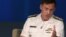 U.S. Navy Admiral Michael Rogers, who heads U.S. Cyber Command and the National Security Agency, urges timely access to data. He's shown speaking at a forum in Washington, D.C, May 11, 2015. 