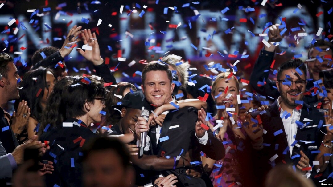 Singer Trent Harmon, the winner of the final season of 'American Idol', is congratulated during the show's Grand Finale in Hollywood, California, April 7, 2016