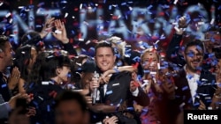 Singer Trent Harmon, the winner of the final season of 'American Idol', is congratulated during the show's Grand Finale in Hollywood, California, April 7, 2016