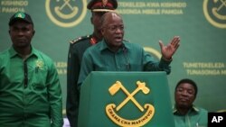 President John Magufuli speaks at the national congress of his ruling Chama cha Mapinduzi party in Dodoma, Tanzania, July 11, 2020. Magufuli is seeking reelection; opposition parties and rights groups want an independent body to oversee October's vote.