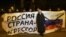 UKRAINE – Ukrainian protesters hold a banner reading ""Russia is an aggressor country" during a rally in Mariupol, on the south coast of the Azov Sea, eastern Ukraine, on November 28, 2018.