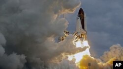 The space shuttle Endeavour lifts off from Kennedy Space Center at Cape Canaveral, Florida, May 16, 2011.