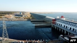 FILE - A general view of the Cambodia's 400 megawatt Lower Sesan 2 hydroelectric dam is seen during the inauguration in Stung Treng province, Dec. 17, 2018. 