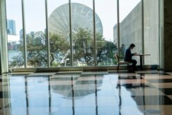 A member of the Irish delegation works on his computer in the main lobby of the United Nations headquarters, Sept. 21, 2020. In 2020, which marks the 75th anniversary of the United Nations.