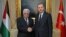 Turkey's Prime Minister Recep Tayyip Erdogan (r) and Palestinian President Mahmoud Abbas in Ankara, Turkey,  April 22, 2013. 