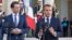 Austrian Chancellor Sebastian Kurz, left, and French President Emmanuel Macron make declarations prior to their meeting at the Elysee Palace in Paris, Sept. 17, 2018. 