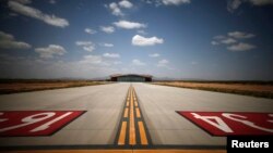 Spaceport America's Virgin Galactic Gateway to Space Building is seen at the end of the road to the main runway, near Truth or Consequences, New Mexico, May 1, 2014.