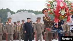 North Korean leader Kim Jong Un visits the Fatherland Liberation War Martyrs Cemetery to pay tribute to the fallen fighters of the Korean People's Army, during commemorations to mark the 62nd anniversary of the end of the 1950-53 Korean War in this undate