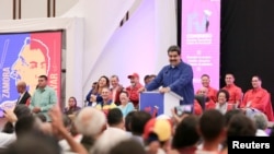 El presidente de Venezuela, Nicolás Maduro, asiste a un plenario del Congreso del Partido Socialista Unido de Venezuela (PSUV) en Caracas, Venezuela, el 30 de julio de 2018. Foto: Palacio de Miraflores / a través de REUTERS -