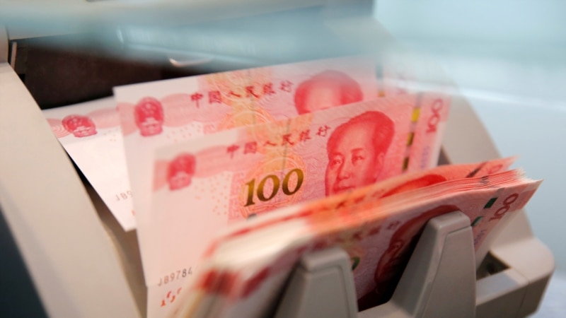 China's credit rating outlook downgraded  ...