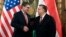 Hungarian Prime Minister Viktor Orban, right, shakes hands with U.S. Energy Secretary Rick Perry during their meeting in Orban's office in the Parliament building in Budapest, Hungary, Nov. 13, 2018.