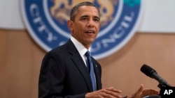 President Barack Obama gestures during a speech at the Belfast Waterfront Hall on June 17, 2013, in Belfast, Northern Ireland.