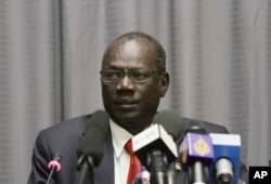 FILE—In this January 5, 2014 photo, South Sudanese Information Minister Michael Makuei attends a press conference in Addis Ababa, Ethiopia.