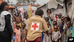 Red Cross officials spread awareness of mpox in the Don Bosco refugee camp in Goma, Democratic Republic of Congo, on Aug. 22, 2023.