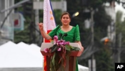 FILE - Philippine Vice President-elect Sara Duterte, girl  of outgoing populist president   of the Philippines, delivers her code   during her oath-taking rites successful  her hometown successful  Davao city, confederate  Philippines, connected  June 19, 2022.