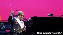 FILE - Elton John performs onstage during his "Farewell Yellow Brick Road" final tour at Madison Square Garden, March 5, 2019, in New York.
