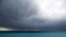 A man looks at an approaching storm in Nice, southeastern France.