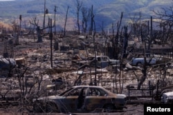 Fire damage is shown in the Wahikuli Terrace neighborhood in the fire ravaged town of Lahaina on the island of Maui in Hawaii, Aug. 15, 2023.