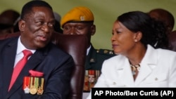 FILE: Emmerson Mnangagwa and his wife Auxillia, right, at the presidential inauguration ceremony in the capital Harare, Zimbabwe Friday, Nov. 24, 2017.(AP)