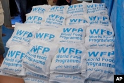 FILE - Food parcels provided by the World Food Program are stacked astatine  the Reyhanli borderline  crossing with Syria, adjacent   Hatay, Turkey, connected  May 24, 2017. The U.N. reports that successful  September 2024, 3 successful  each   4 radical   successful  Syria request   humanitarian assistance.