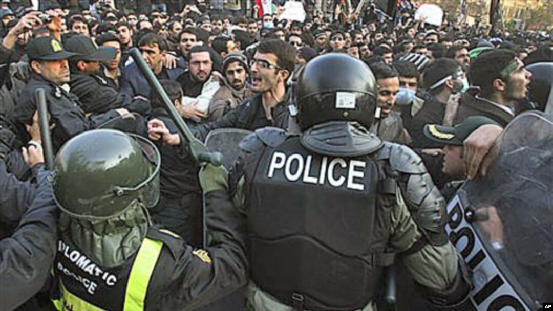 Iranian police prevent some protesters from entering the British Embassy, in Tehran, Iran, November 29, 2011.