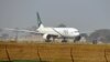 FILE - A Pakistan International Airline (PIA) plane taxis on the runway on the way to Saudi Arabia, Feb. 8, 2016. 