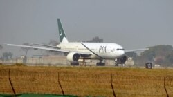 FILE - A Pakistan International Airline (PIA) plane taxis on the runway on the way to Saudi Arabia, Feb. 8, 2016.