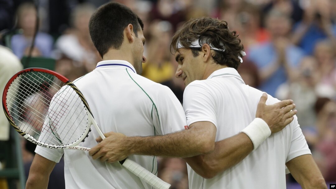 Pozdrav na mreži: Novak Đoković i Rodžer Federer 
