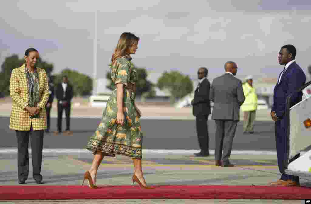 First lady Melania Trump boards a plane at Jomo Kenyatta International Airport in Nairobi, Kenya, Oct. 6, 2018. 